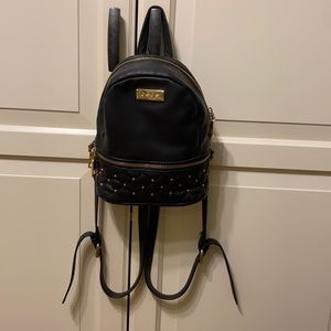 Black BEBE adjustable mini backpack